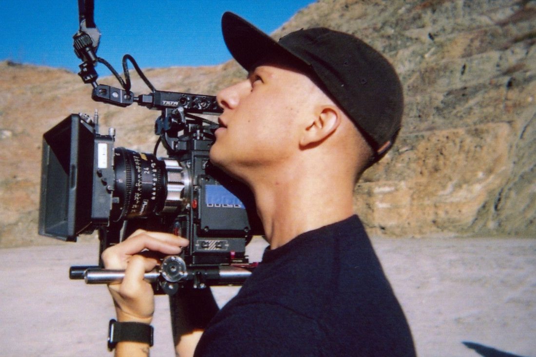 Operator shooting handheld on location