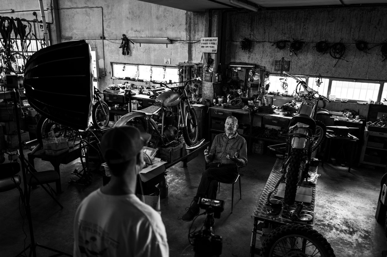 Lit interview set-up inside a workshop