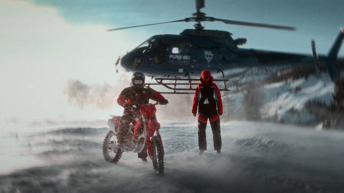 Helicopter and rider in the snow
