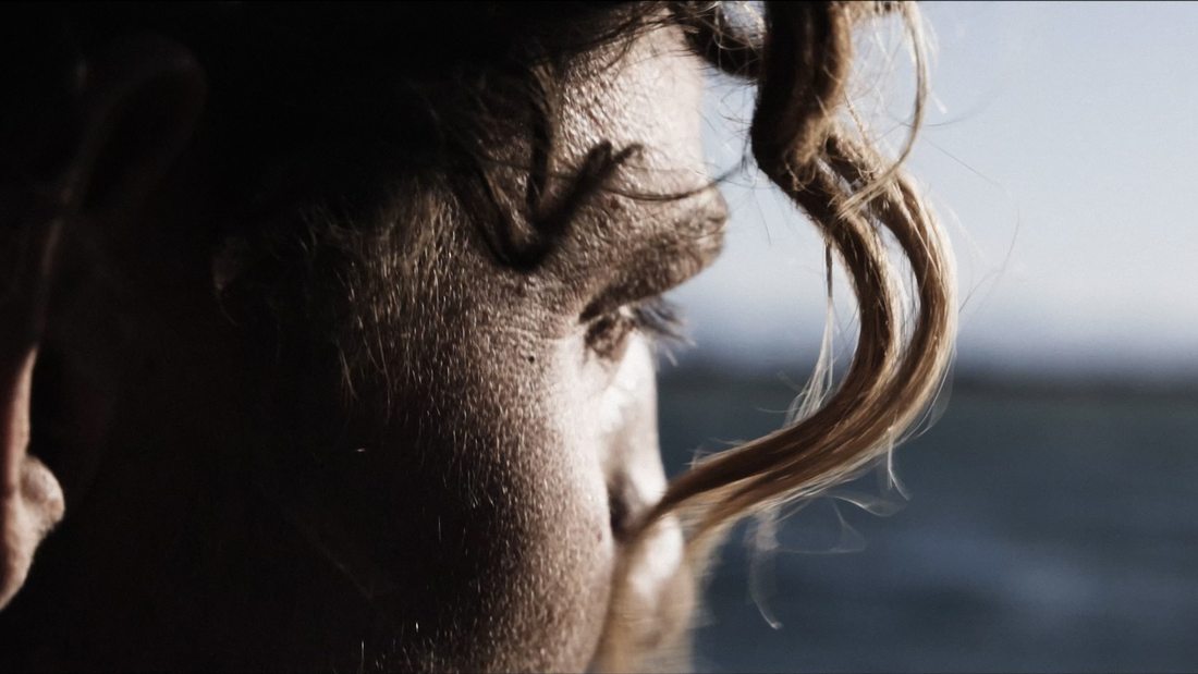 Salt and hair, close on the face